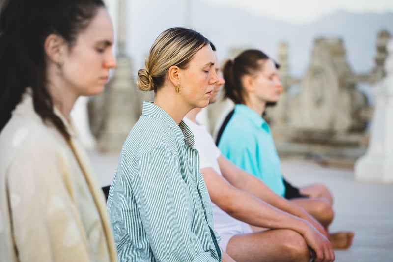 Woman practicing alternate nostril breathing